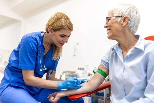 A nurse draws blood for diagnostics and lab testing in Greenville, South Carolina.
